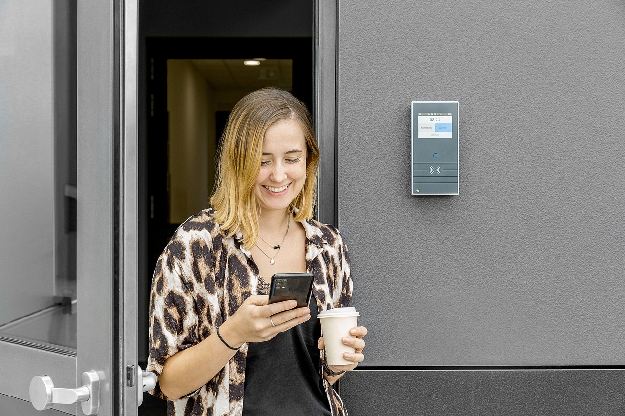 Woman smiling while using a productivity app on her device